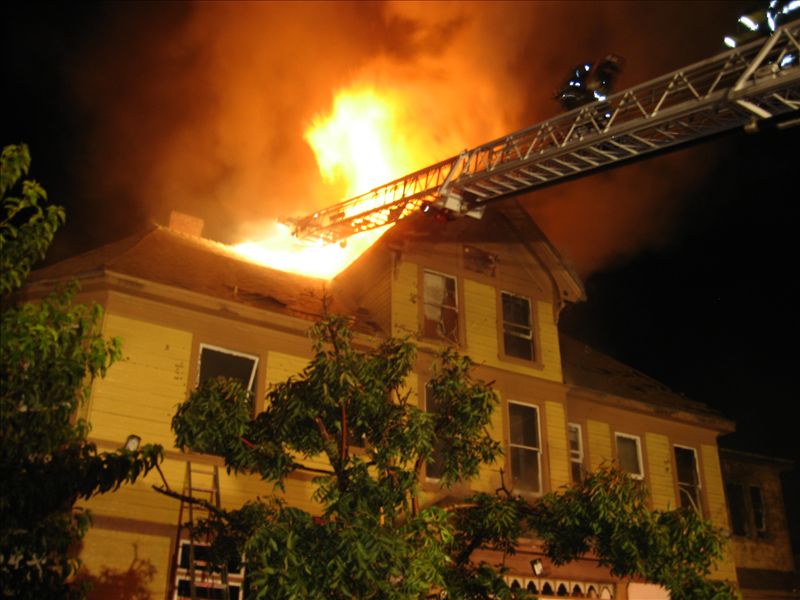 Ladder truck at 2-story Victorian fire